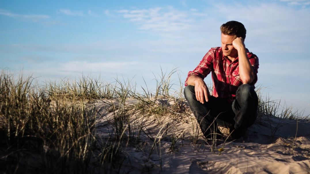 a man sitting alone