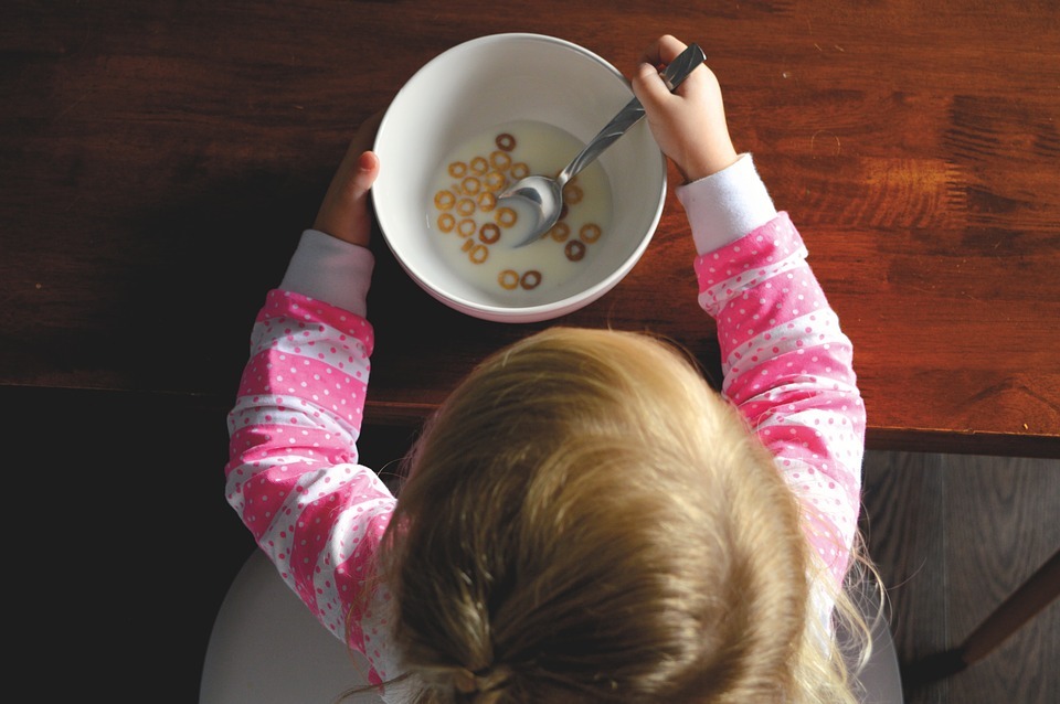 Once a baby grows up, he can eat cereal on his own