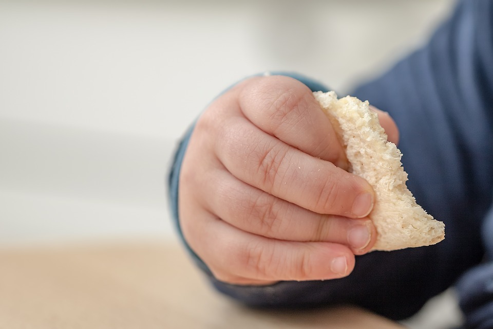 Baby eating solid food