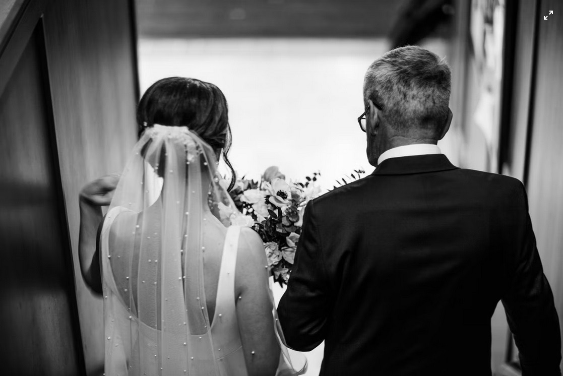 father walking the bride down the aisle